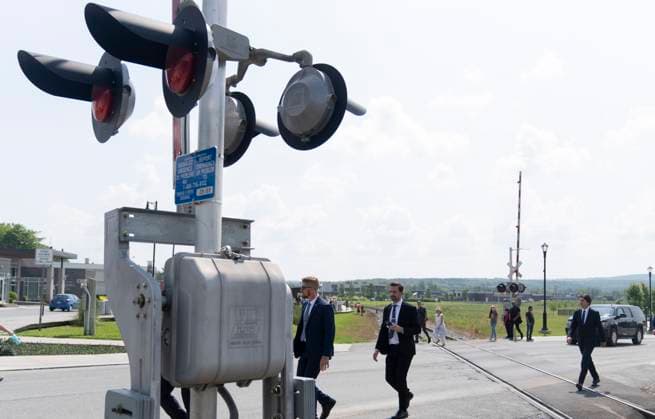July 6, 2023, LAC MEGANTIC, PQ, CANADA: Prime Minister Justin Trudeau crosses the train tracks as he arrives to attend a commemorative mass to pay tribute to the 47 lives lost on the tenth anniversary of the 2013 rail disaster in Lac Megantic, Que. on Thursday, July 6, 2023. LAC MEGANTIC CANADA  - ZUMAc35_ 20230706_zaf_c35_023 Copyright: xChristinnexMuschix