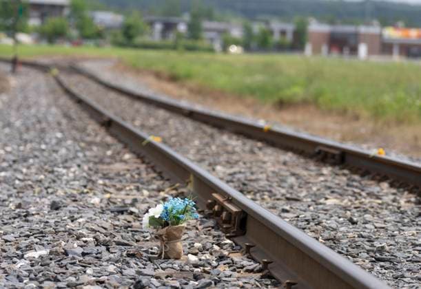 July 6, 2023, LAC MEGANTIC, PQ, CANADA: Flowers are left beside the train tracks following a citizenöÄÃ s rally, in memory of the 47 victims and their families on the tenth anniversary of the train derailment in Lac Megantic, Que. on Thursday, July 6, 2023. LAC MEGANTIC CANADA  - ZUMAc35_ 20230706_zaf_c35_038 Copyright: xChristinnexMuschix