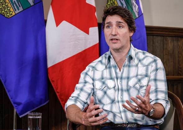 July 7, 2023, Calgary, AB, CANADA: Prime Minister Justin Trudeau gestures as he meets with Alberta Premier Danielle Smith in Calgary, Alta., Friday, July 7, 2023. Calgary CANADA  - ZUMAc35_ 20230707_zaf_c35_030 Copyright: xJeffxMcintoshx
