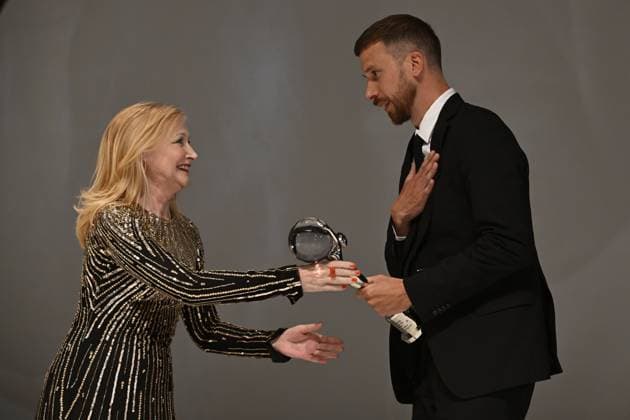 The last day of the 57th Karlovy Vary International Film Festival, July 8, 2023. Norwegian actor Herbert Nordrum receives the Male Actor Award for his role in Hypnosis at the closing ceremony. The award was presented to him by American actress Patricia Clarkson. (CTKxPhoto KaterinaxSulova) CTKPhotoP2023070804986  CTKPhotoP2023070804986
