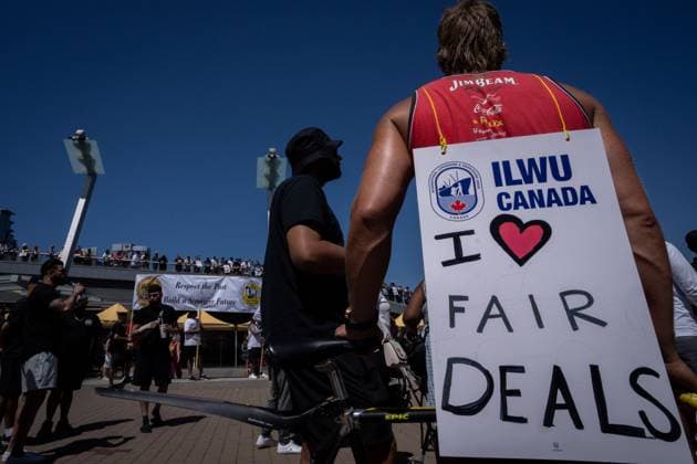 July 9, 2023, VANCOUVER, BC, CANADA: Striking port workers from the International Longshore and Warehouse Union Canada gather at Jack Poole Plaza while attending a rally in Vancouver, on Sunday, July 9, 2023. VANCOUVER CANADA  - ZUMAc35_ 20230709_zaf_c35_041 Copyright: xEthanxCairnsx