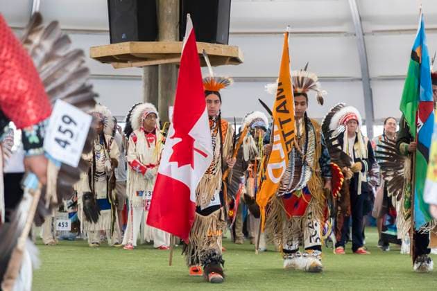 Enoch Cree Nation, Canada July 9, 2023 - Participants dance in traditional costumes called Regalia during the 29th Annual Enoch Cree Nation Pow Wow Competition on July 9, 2023 in Enoch Cree Nation, Canada. Pow Wow is the way native peoples come together to dance, sing, celebrate and honor traditions. From 1886 to 1951, the Canadian government banned the practice of Pow Wows ceremonies with the aim of assimilation. NATIVE, AUTOCHTONES D AMERIQUE, AMERINDIENS, FESTIVAL DE POW WOW, COMPETITION DE POWWOW, CULTURE CANADIENNE, CANADA, ALBERTA, EDMONTON, COSTUMES TRADITIONNELS, TRADITION, PREMIERES NATIONS, LIFESTYLES, INDIENS D AMERIQUE, EVENEMENT CULTUREL, IDENTITE, RESERVE, AMERIQUE DU NORD, PEUPLES, CELEBRATIONS, HERITAGE CULTUREL, DANSES, DA  Copyright: xVincentxIsorex