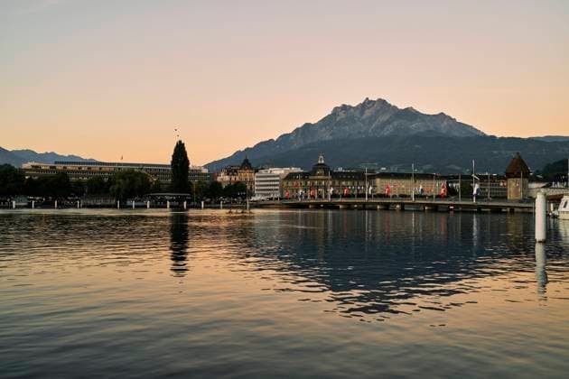 Scenic cityscape with historic buildings near river at sundown Lucerne, Canton of Lucerne, Switzerland R_OSBJ220909-1037151-01