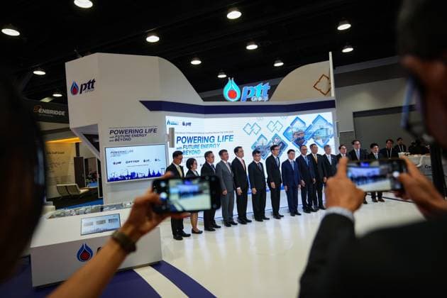 July 10, 2023, VANCOUVER, BC, CANADA: Delegates pose for a photo at the booth of Thailand s state owned PTT Group during the LNG2023 conference, in Vancouver, B.C., Monday, July 10, 2023. VANCOUVER CANADA  - ZUMAc35_ 20230710_zaf_c35_131 Copyright: xDarrylxDyckx