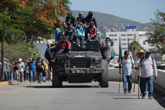July 11, 2023, Chilpancingo, Guerrero, Mexico: Demonstrators mounted on an armoured truck that they seized from the National Guard, with which they broke down the doors of the local Congress and reached the executive branch. Chilpancingo Mexico - ZUMAs310 20230711_zip_s310_008 Copyright: xLuisxExSalgadox