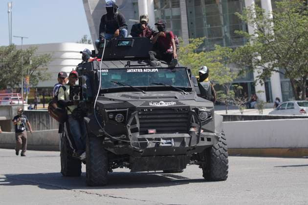July 11, 2023, Chilpancingo, Guerrero, Mexico: Demonstrators mounted on an armoured truck that they seized from the National Guard, with which they broke down the doors of the local Congress and reached the executive branch. Chilpancingo Mexico - ZUMAs310 20230711_zip_s310_009 Copyright: xLuisxExSalgadox