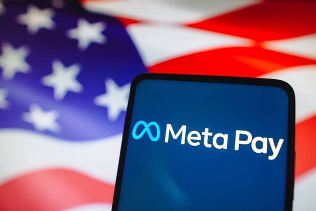 May 16, 2023, Brazil. In this photo illustration, the Meta Pay logo is displayed on a smartphone screen and in the background, the flag of the United States of America. May 16, 2023, Brazil. In this photo illustration, the Meta Pay logo is displayed on a smartphone screen and in the background, the flag of the United States of America Copyright: xZoonar.com rafapressx 20314570