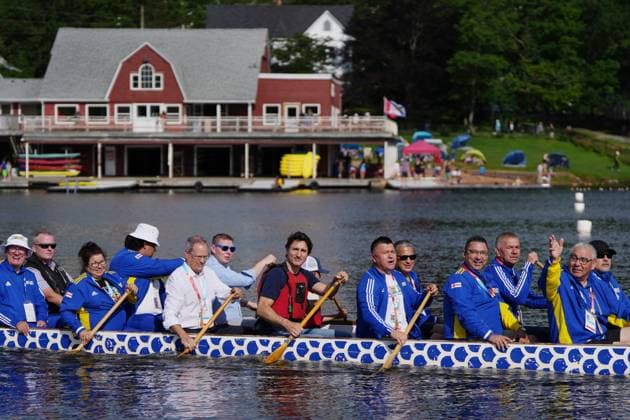 July 17, 2023, Halifax, NS, Canada: Prime Minister Justin Trudeau, centre, joins chiefs and other dignitaries in paddling across Lake Banook prior to Canoe Kayak competition at the North American Indigenous Games 2023 in Halifax, N.S. on Monday, July 17, 2023. Halifax Canada  - ZUMAc35_ 20230717_zaf_c35_064 Copyright: xDarrenxCalabresex