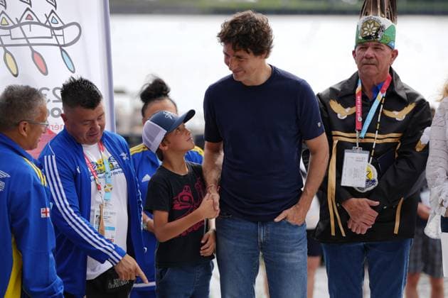 July 17, 2023, Halifax, NS, Canada: Prime Minister Justin Trudeau, second from right, shakes hands with his son Hadrien as they join chiefs and other dignitaries prior to the Canoe Kayak competition at the North American Indigenous Games 2023 in Halifax, Monday, July 17, 2023. Halifax Canada  - ZUMAc35_ 20230717_zaf_c35_072 Copyright: xDarrenxCalabresex