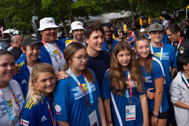 July 17, 2023, Halifax, NS, Canada: Prime Minister Justin Trudeau, centre, poses with athletes from Team Nova Scotia prior to Canoe Kayak competition at the North American Indigenous Games 2023 in Halifax, Monday, July 17, 2023. Halifax Canada  - ZUMAc35_ 20230717_zaf_c35_076 Copyright: xDarrenxCalabresex