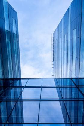 Creative Highlights World Reflections in glass facade of an office high rise. Reflections in glass facade of an office high rise Copyright: xZoonar.com TrygvexFinkelsenx 20344533