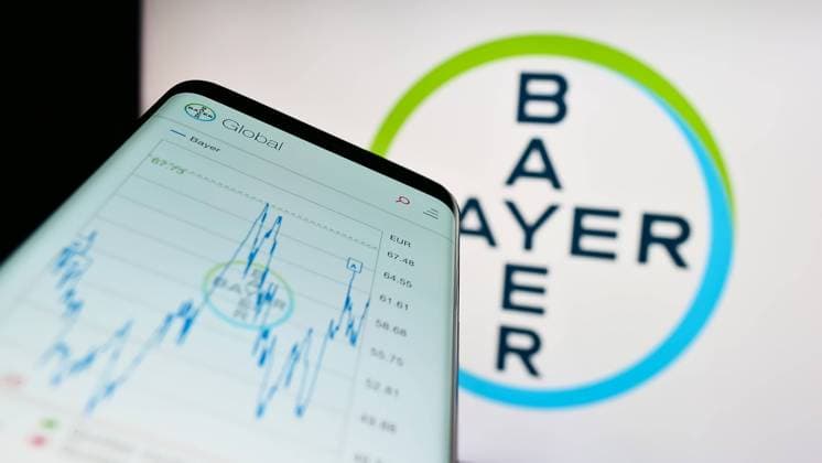 Mobile phone with webpage of German pharmaceutical company Bayer AG on screen. Stuttgart, Germany - 04-16-2023: Mobile phone with webpage of German pharmaceutical company Bayer AG on screen in front of business logo. Focus on top-left of phone display. Copyright: xZoonar.com TimonxSchneiderx 20164404