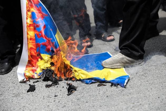 Iran: Demonstrations against the burning of the Quran Iranian demonstrators burn a Swedish flag, during a protest of the burning of a Quran in Sweden, in Tehran, Iran, Friday, July 21, 2023. On Thursday, a man who identified himself in Swedish media as a refugee from Iraq burned a Quran for the second time in central Stockholm. Tehran Tehran Iran Copyright: SobhanxFarajvan