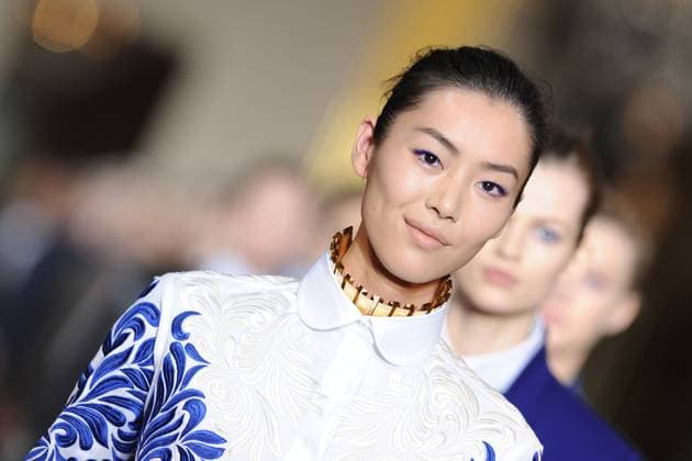 Paris Fashion Week - Stella McCartney Model Liu Wen displays a creation British designer Stella McCartney for her Fall-Winter 2012-2013 Ready-To-Wear collection show held at City Hall in Paris, France, on March 5, 2012. Photo by Thierry Orban ABACAPRESS.COM Paris France  Copyright: xBriquet-Gorassini-Gouhier-Guibbaud-Orban-Wyters ABACAx 311622_056 Briquet-Gorassini-Gouhier-Guibbaud-Orban-Wyters ABACAx 311622_056 