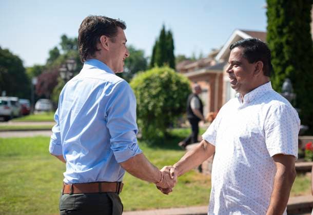 July 22, 2023, Scarborough, ONT, CANADA: Prime Minster Justin Trudeau shakes hands with MP Gary Anandasangaree, during a visit to a home in Scarborough, Ont., to commemorate the 40th anniversary of Black July on Saturday, July 22, 2023. Scarborough CANADA  - ZUMAc35_ 20230722_zaf_c35_017 Copyright: xTijanaxMartinx