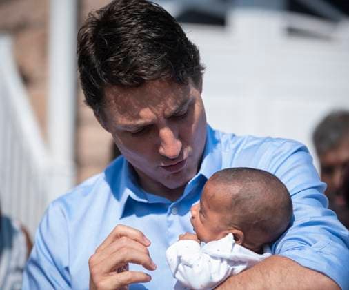 July 22, 2023, Scarborough, ONT, CANADA: Prime Minster Justin Trudeau holds Vikram Puviarasu during a visit at a family home in Scarborough, Ont., to commemorate the 40th anniversary of Black July on Saturday, July 22, 2023. Scarborough CANADA  - ZUMAc35_ 20230722_zaf_c35_018 Copyright: xTijanaxMartinx