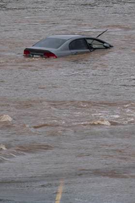 July 22, 2023, Halifax, NS, Canada: An abandoned car in a mall parking lot is seen in floodwater following a major rain event in Halifax on Saturday, July 22, 2023. Halifax Canada  - ZUMAc35_ 20230722_zaf_c35_028 Copyright: xDarrenxCalabresex