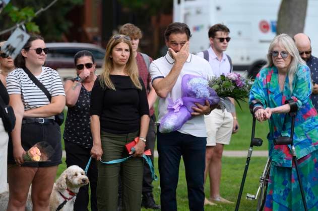 July 22, 2023, Toronto, ON, Canada: Friends and family members of Julianna Kozis and Reese Fallon, gather near trees planted in their honour, following a gathering to mark five years since the attack on the city s Danforth Avenue, at Withrow Park in Toronto, Saturday July 22, 2023. Toronto Canada  - ZUMAc35_ 20230722_zaf_c35_077 Copyright: xChristopherxKatsarovx