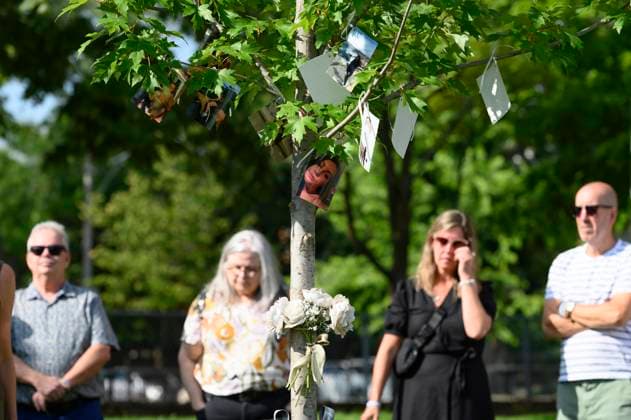 July 22, 2023, Toronto, ON, Canada: Friends and family members of Julianna Kozis and Reese Fallon, gather near trees planted in their honour, during a gathering to mark five years since the attack on the city s Danforth Avenue, at Withrow Park in Toronto, Saturday July 22, 2023. Toronto Canada  - ZUMAc35_ 20230722_zaf_c35_090 Copyright: xChristopherxKatsarovx