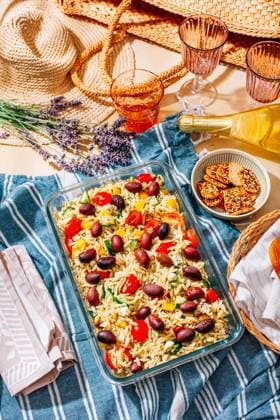 Picnic time - homemade orzo pasta salad with feta Picnic time - homemade orzo pasta salad with feta, olives, tomatoes Copyright: xZoonar.com IngridxBalabanovax 20501618
