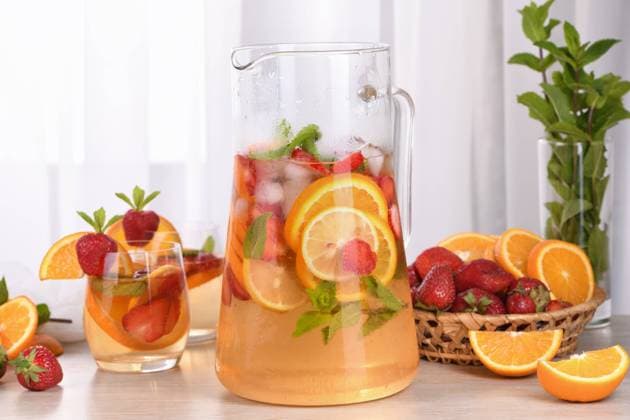 Summer Sangria cocktail Summer Sangria cocktail or lemonade with strawberry, orange and mint. Refreshing organic non-alcoholic, Detox vitaminized healthy drink, fruit in a glass Copyright: xZoonar.com MarynaxVoronovax 20503196