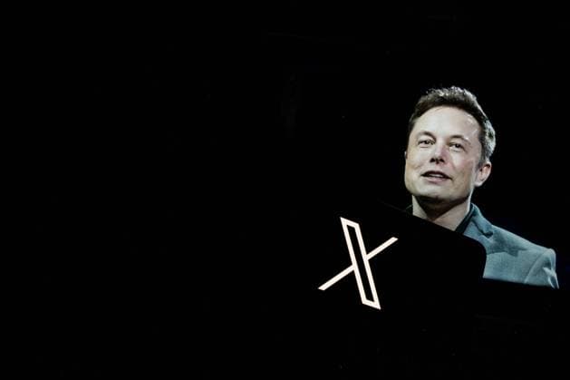 Italy: Twitter announces a New Logo In this photo illustration, a picture of Elon Musk can be seen on a mobile device with the X and Twitter logos. Rome Italy Italy Copyright: AndreaxRonchini