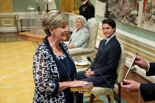 July 26, 2023, Ottawa, ON, Canada: Prime Minister Justin Trudeau looks on as Minister of National Revenue Marie-Claude Bibeau takes the oath during a cabinet swearing-in ceremony at Rideau Hall in Ottawa on Wednesday, July 26, 2023. Ottawa Canada  - ZUMAc35_ 20230726_zaf_c35_123 Copyright: xAdrianxWyldx