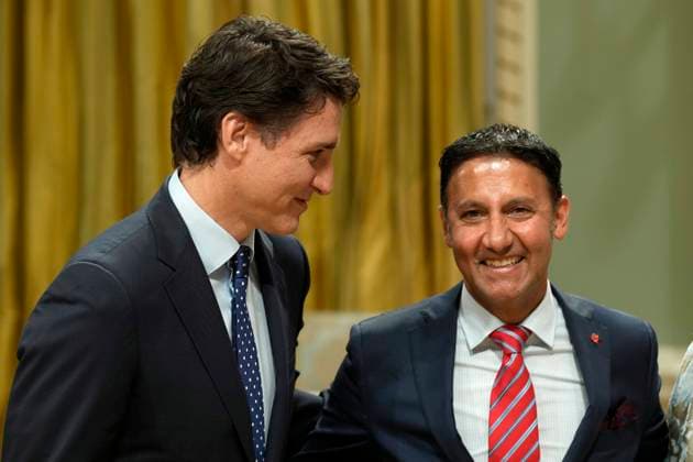 July 26, 2023, Ottawa, ON, Canada: Minister of Justice and Attorney General of Canada Arif Virani poses for a photo with Prime Minister Justin Trudeau during a cabinet swearing-in ceremony at Rideau Hall in Ottawa, Wednesday, July 26, 2023. Ottawa Canada  - ZUMAc35_ 20230726_zaf_c35_156 Copyright: xAdrianxWyldx