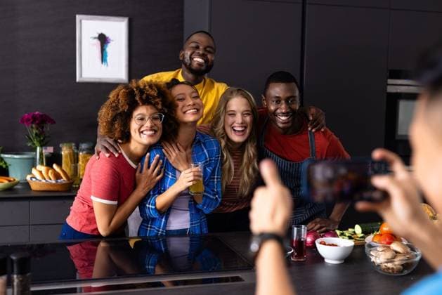 Happy diverse group of friends taking photo with smartphone in kitchen Happy diverse group of friends taking photo with smartphone in kitchen. Domestic life, friendship, togetherness, food and lifestyle, unaltered., model released, , property released, Cape Town, South Africa, 25.04.2023, 4133667.jpg, people,happy,diverse group,friend,taking photo,smartphone,kitchen,domestic life,friendship,togetherness,food,gen z,lifestyle,unaltered,young,healthy,together,person,phone,fun,happiness,cheerful,adult,smile,smiling,cooking,fresh,mobile,leisure,portrait,friends,meal,attractive,diverse,group,taking,photo,domestic,life Young Adult,Woman,Female,Asian,Chinese,Man,Male,Black,Multiracial,White,Other