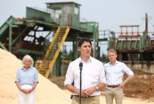 July 27, 2023, Summerford, NL, CANADA: Prime Minister Justin Trudeau with Liberal Members of Parliment Joanne Thompson, and Seamus O Regan, Minister of Labour and Seniors at a media briefing during a visit to Cottles Island Lumber in Summerford, Newfoundland and Labrador on Thursday, July 27, 2023. Summerford CANADA  - ZUMAc35_ 20230727_zaf_c35_014 Copyright: xPaulxDalyx