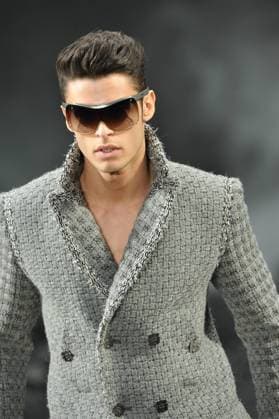 Chanel Fashion Show - Paris Baptiste Giabiconi diplays a creation designed by Karl Lagerfeld for Chanel Fall-Winter 2011 2012 Ready-to-Wear collection show held at Le Grand Palais, in Paris, France on March 8, 2011. Photo by Thierry Orban ABACAPRESS.COM Paris France  Copyright: xBriquet-Guibbaud-Nebinger-Orban ABACAx 266466_010 Briquet-Guibbaud-Nebinger-Orban ABACAx 266466_010 