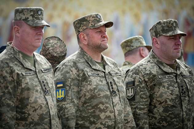 July 28, 2023, Kyiv, Kiev Oblast, Ukraine: Ukrainian Armed Forces Commander Gen. Valerii Zaluzhnyi, center, listens to President Volodymyr Zelenskyy during a ceremony marking the Day of Ukrainian Statehood on Mykhailivska Square, July 28, 2023 in Kyiv, Ukraine. Kyiv Ukraine - ZUMAp138 20230728_zaa_p138_050 Copyright: xUkrainianxPresidentialxPressxOffx