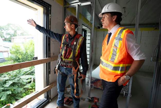 July 31, 2023, Hamilton, Ont, CAN: Prime Minister Justin Trudeau speaks with construction worker Patrick Van Dam during a visit to an apartment complex under construction in Hamilton, Ont., Monday, July 31, 2023. He was joined today by the Mayor of Hamilton, Andrea Horwath, to announce a joint investment of nearly $64 million from the Government of Canada and the City of Hamilton to build and repair 214 homes for families in the city. Hamilton CAN - ZUMAc35_ 20230731_zaf_c35_057 Copyright: xPeterxPowerx