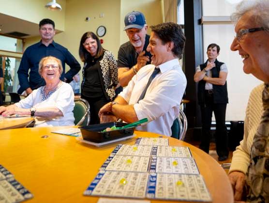 July 31, 2023, Hamilton, Ont, CAN: Prime Minister Justin Trudeau gets a light hearted warning from Robert MacDonald, 80, after the Prime Minister sat down with his girlfriend, June Browning, right, during a visit to Sackville Hill Senior Recreation Centre in Hamilton, Ont., Monday, July 31, 2023. Hamilton CAN - ZUMAc35_ 20230731_zaf_c35_077 Copyright: xPeterxPowerx
