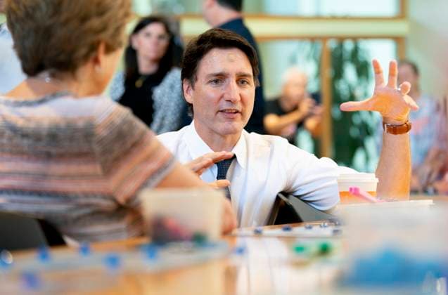 July 31, 2023, Hamilton, Ont, CAN: Prime Minister Justin Trudeau chats with seniors playing bingo during a visit to Sackville Hill Senior Recreation Centre in Hamilton, Ont., Monday, July 31, 2023. Hamilton CAN  - ZUMAc35_ 20230731_zaf_c35_081 Copyright: xPeterxPowerx