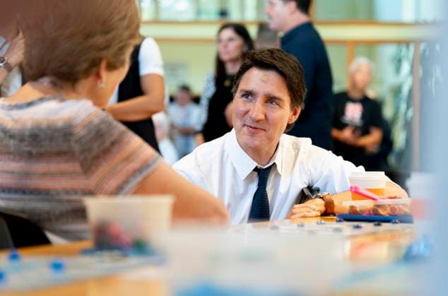 July 31, 2023, Hamilton, Ont, CAN: Prime Minister Justin Trudeau chats with seniors playing bingo during a visit to Sackville Hill Senior Recreation Centre in Hamilton, Ont., Monday, July 31, 2023. Hamilton CAN  - ZUMAc35_ 20230731_zaf_c35_082 Copyright: xPeterxPowerx
