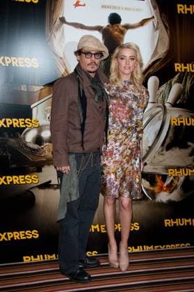 The Rum Diary Photocall - Paris Amber Heard and Johnny Depp attending the Rhum Express (The Rum Diary) Photocall, before the Premiere in Paris, held at the Plaza Athenee Hotel on November 08, 2011 in Paris, France. Photo by Nicolas Genin ABACAPRESS.COM Paris France  Copyright: xGeninxNicolas ABACAx 296947_007 GeninxNicolas ABACAx 296947_007 