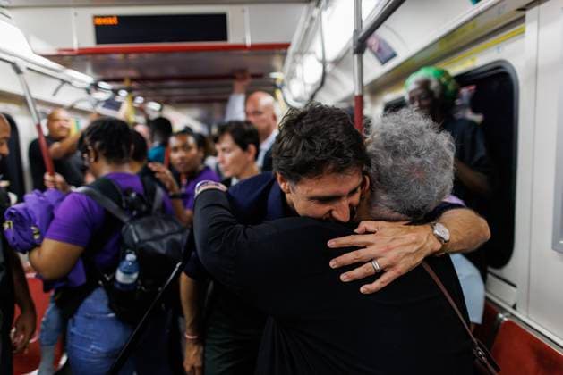 July 31, 2023, TORONTO, ON, CANADA: Canadian Prime Minister Justin Trudeau greets people on a TTC train in Toronto, during the Underground Freedom Train Ride in Toronto, an event commemorating the abolition of slavery in the British Empire, Monday July 31, 2023. TORONTO CANADA  - ZUMAc35_ 20230731_zaf_c35_107 Copyright: xColexBurstonx