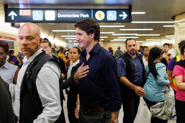 August 1, 2023, TORONTO, ON, CANADA: Canadian Prime Minister Justin Trudeau greets people inside a transit station in Toronto, during the Underground Freedom Train Ride in Toronto, an event commemorating the abolition of slavery in the British Empire, Tuesday, Aug. 1, 2023. TORONTO CANADA  - ZUMAc35_ 20230801_zaf_c35_015 Copyright: xColexBurstonx