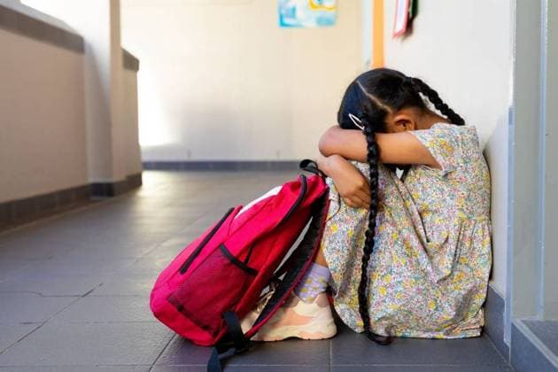 Sad biracial schoolgirl with school bag sitting at wall at elementary school corridor, copy space Sad biracial schoolgirl with school bag sitting at wall at elementary school corridor, copy space. Stress, education, childhood, development, learning and school, unaltered., model released, , property released, Cape Town, South Africa, 01.04.2023, 4062027.jpg, people,sad,biracial,schoolgirl,school,bag,sitting,wall,elementary school,corridor,copy space,stress,education,childhood development,learning,unaltered,student,study,knowledge,studying,college,university,book,classroom,learn,class,lesson,elementary,childhood,kid,pupil,teacher,unhappy,homework,desk,depression,copy,space,development Child,Girl,Female