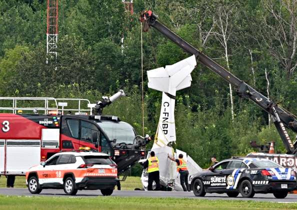 August 1, 2023, QUEBEC CITY, PQ, Canada: A Cessna 152 aircraft is towed away after it crashed on landing at the Jean-Lesage Airport Tuesday, Aug.1, 2023 in Quebec City. One person was reported injured. QUEBEC CITY Canada  - ZUMAc35_ 20230801_zaf_c35_024 Copyright: xJacquesxBoissinotx