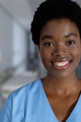 Portrait of happy african american female doctor wearing scrubs in corridor at hospital Portrait of happy african american female doctor wearing scrubs in corridor at hospital. Hospital, medicine, healthcare and work, unaltered., model released, , property released, Cape Town, South Africa, 2023-05-19T22:00:00.000Z, 4139333.jpg, people,portrait,happy,african american,female doctor,wearing,scrub,corridor,hospital,medicine,healthcare,work,unaltered,medical,doctor,clinic,care,health,treatment,patient,young,person,illness,professional,disease,adult,nurse,face,smile,attractive,virus,lifestyle,african,american,female Young Adult,Woman,Female,Black