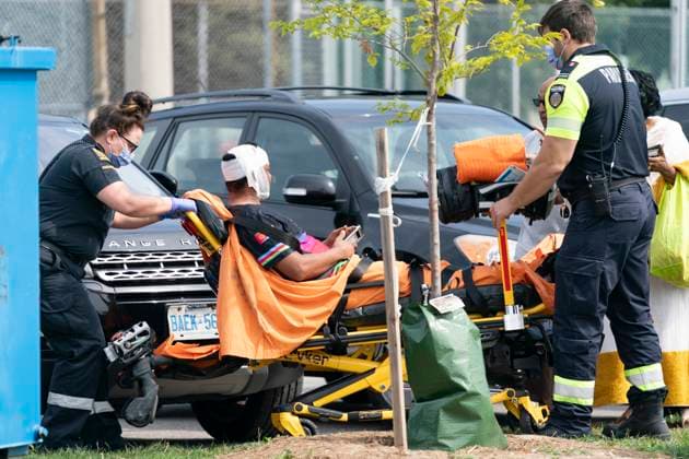August 5, 2023, Toronto, ON, Canada: Toronto Paramedics treat a patient at the scene of a protest that turned violent in Earlscourt Park in Toronto, on Saturday, August 5 2023. Toronto police say one person was stabbed and eight others were injured during a protest in the cityöÄÃ s west end. Toronto Canada  - ZUMAc35_ 20230805_zaf_c35_003 Copyright: xArlynxMcadoreyx