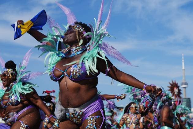 August 5, 2023, Toronto, ON, CAN: Revellers takes part in the Toronto Caribbean Carnival, on Saturday, August 5, 2023. Toronto CAN  - ZUMAc35_ 20230805_zaf_c35_102 Copyright: xChrisxYoungx