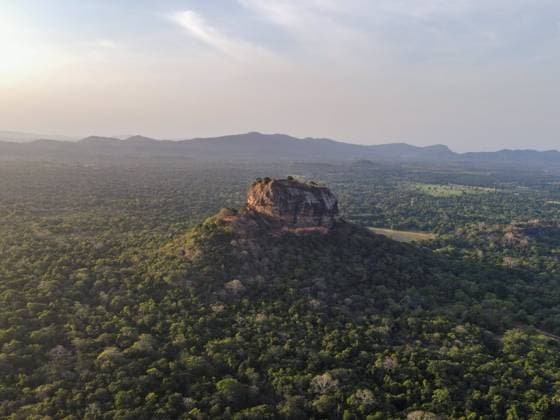 Sigiriya, The Lion Fortress Of Sri Lanka An Aerial View of Sigiriya Rock on August 6, 2023, in Dambulla, Sri Lanka. Sigiriya Lion Rock is an ancient rock fortress known for its massive column of rock that reaches nearly 200 metres high. The site dates back to the reign of King Kasyapa (4774-4795 AD), who chose this site as his new capital. He decorated the walls with frescoes and built an impressive palace right on top of the rock column, accessible only through the mouth of an enormous carved lion. It is located at a distance of 178 km from Colombo and has become a popular tourist spot for foreigners from all over the world. Dambulla Matale Sri Lanka  Copyright: xThilinaxKaluthotagex originalFilename: kaluthotage-notitle230806_npJNK.jpg