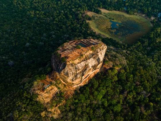 Sigiriya, The Lion Fortress Of Sri Lanka An Aerial View of Sigiriya Rock on August 6, 2023, in Dambulla, Sri Lanka. Sigiriya Lion Rock is an ancient rock fortress known for its massive column of rock that reaches nearly 200 metres high. The site dates back to the reign of King Kasyapa (4774-4795 AD), who chose this site as his new capital. He decorated the walls with frescoes and built an impressive palace right on top of the rock column, accessible only through the mouth of an enormous carved lion. It is located at a distance of 178 km from Colombo and has become a popular tourist spot for foreigners from all over the world. Dambulla Matale Sri Lanka  Copyright: xThilinaxKaluthotagex originalFilename: kaluthotage-notitle230805_npbam.jpg