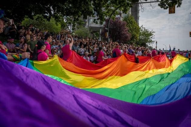 August 6, 2023, VANCOUVER, BC, CANADA: A large pride flag passes during the Pride Parade at English Bay in Vancouver, B.C., Sunday, Aug. 6, 2023. VANCOUVER CANADA  - ZUMAc35_ 20230806_zaf_c35_017 Copyright: xEthanxCairnsx
