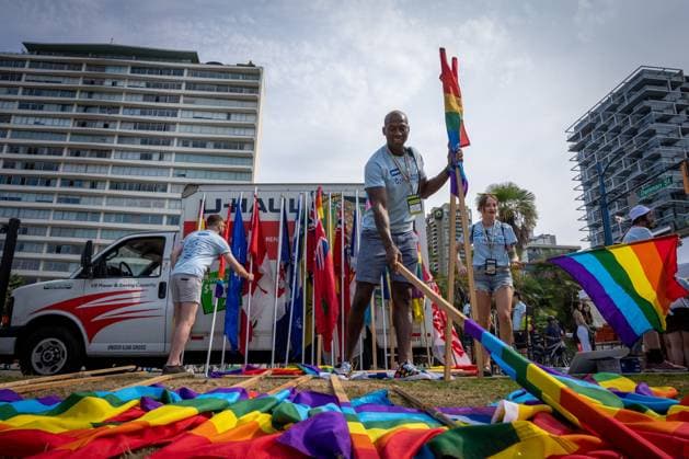 August 6, 2023, VANCOUVER, BC, CANADA: Volunteers organize flags before the Pride Parade at in Vancouver, B.C., Sunday, Aug. 6, 2023. VANCOUVER CANADA  - ZUMAc35_ 20230806_zaf_c35_018 Copyright: xEthanxCairnsx