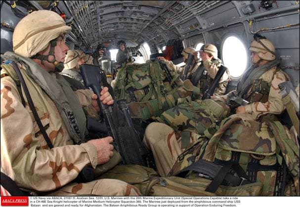 31187 11 US Navy via ABACA. 31187-11. Arabian Sea. 12 01. U.S. Marines with the 26th Marine Expeditionary Unit (Special Operations Capable) take a ride in a CH-46E Sea Knight helicopter of Marine Medium Helicopter Squardon-365. The Marines just deployed from the amphibious command ship USS Bataan and are geared and ready for Afghanistan. The Bataan Amphibious Ready Group is operating in support of Operation Enduring Freedom.  Copyright: xABACAx 31187_11 ABACAx 31187_11