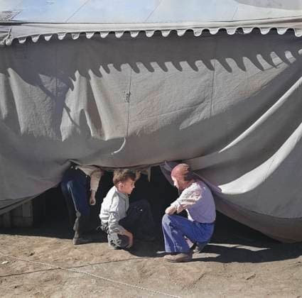 Young Boys sneaking under Circus Tent, Roswell, New Mexico, USA, Arthur Rothstein, U.S. Farm Security Administration, April 1936  Copyright: xCircaxImagesx ghi-circa01626